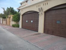 Garage Door Suppliers UAE from AL SHERA DOORS & SHADES 
