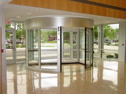 Revolving doors by Maxwell  from MAXWELL AUTOMATIC DOORS CO LLC