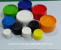 PLASTIC CAPS ( BOTTLE CLOSURES) & MEASURING CUPS from WADS PRODUCTS INDIA