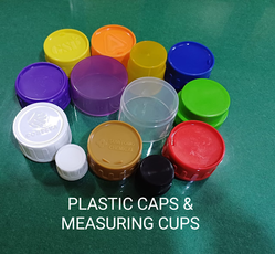 PLASTIC CAPS ( BOTTLE CLOSURES) & MEASURING CUPS